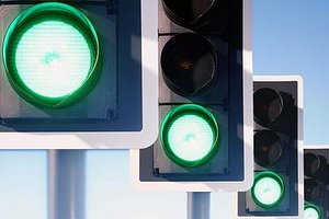a series of green traffic lights